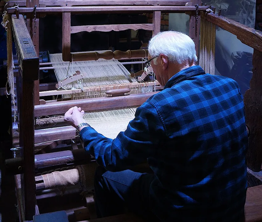 Context photograph: Roubaix An old jacquard weaving loom of wood construction; textile context, not an identified product or supplier on this page.