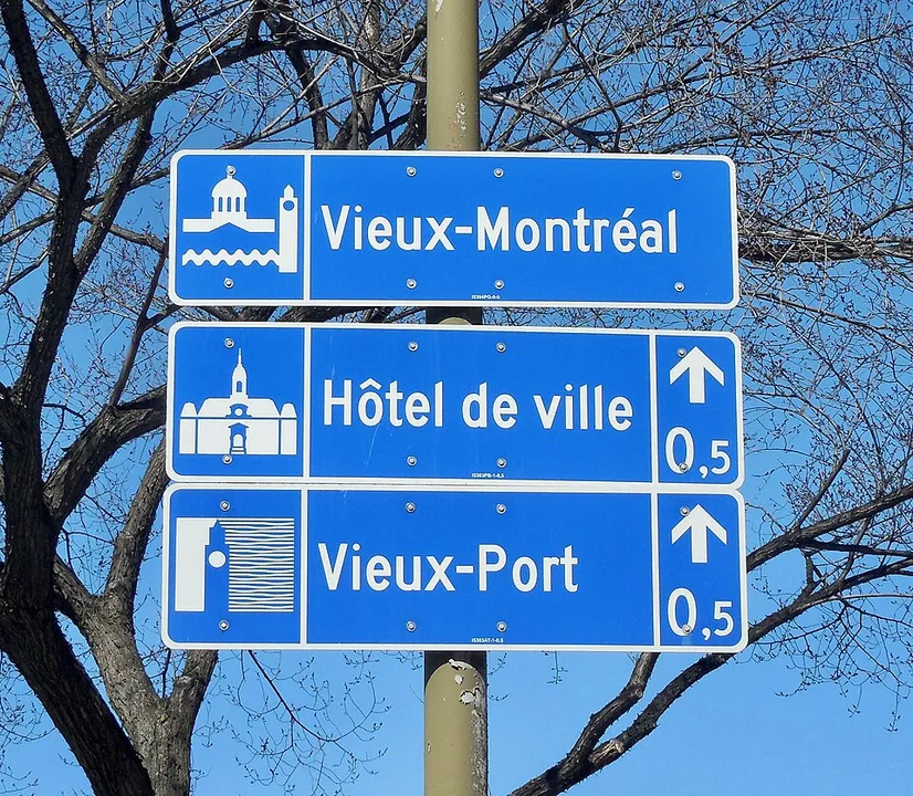Context photograph: WayfindingSign MTL 20150415; signage context, not an identified product or supplier on this page.
