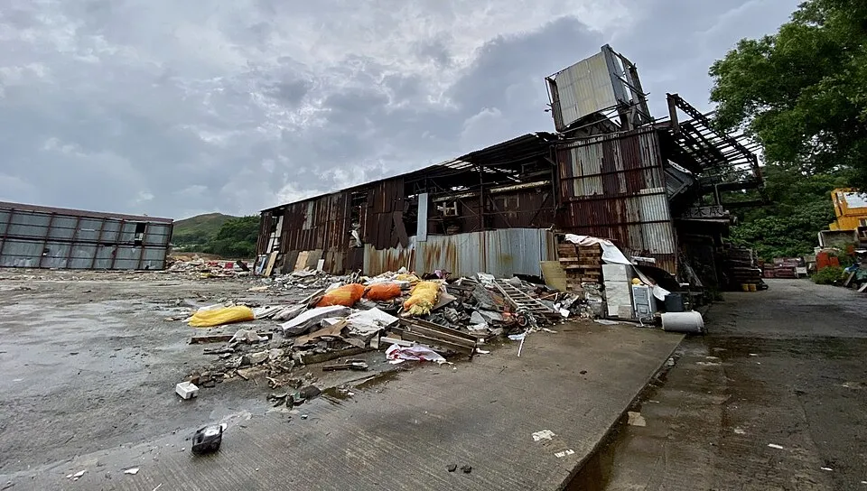 Context photograph: Chi Kee Sawmill & Timber Factory in Kwu Tong demolished 202207; timber context, not an identified product or supplier on this page.