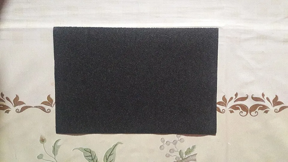 Context photograph: Emery cloth sheet - 01; metal context, not an identified product or supplier on this page.
