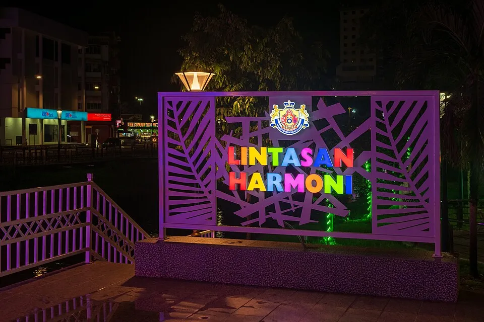 Context photograph: Kluang - Lintasan Harmoni sign illuminated May 2024; signage context, not an identified product or supplier on this page.