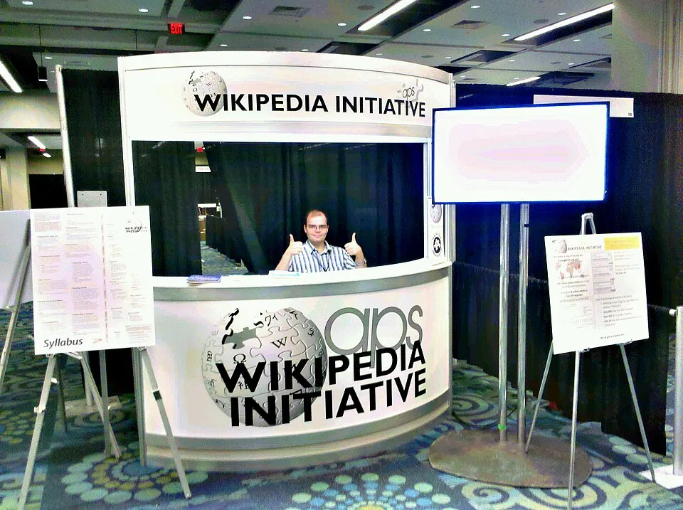 Context photograph: APS Wikipedia booth - Piotrus by Sage; events context, not an identified product or supplier on this page.