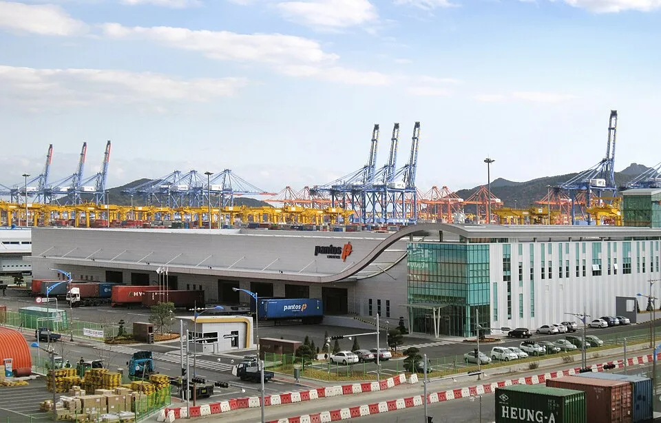 Context photograph: Pantos Logistics - Busan New Port Warehouse; operations context, not an identified product or supplier on this page.