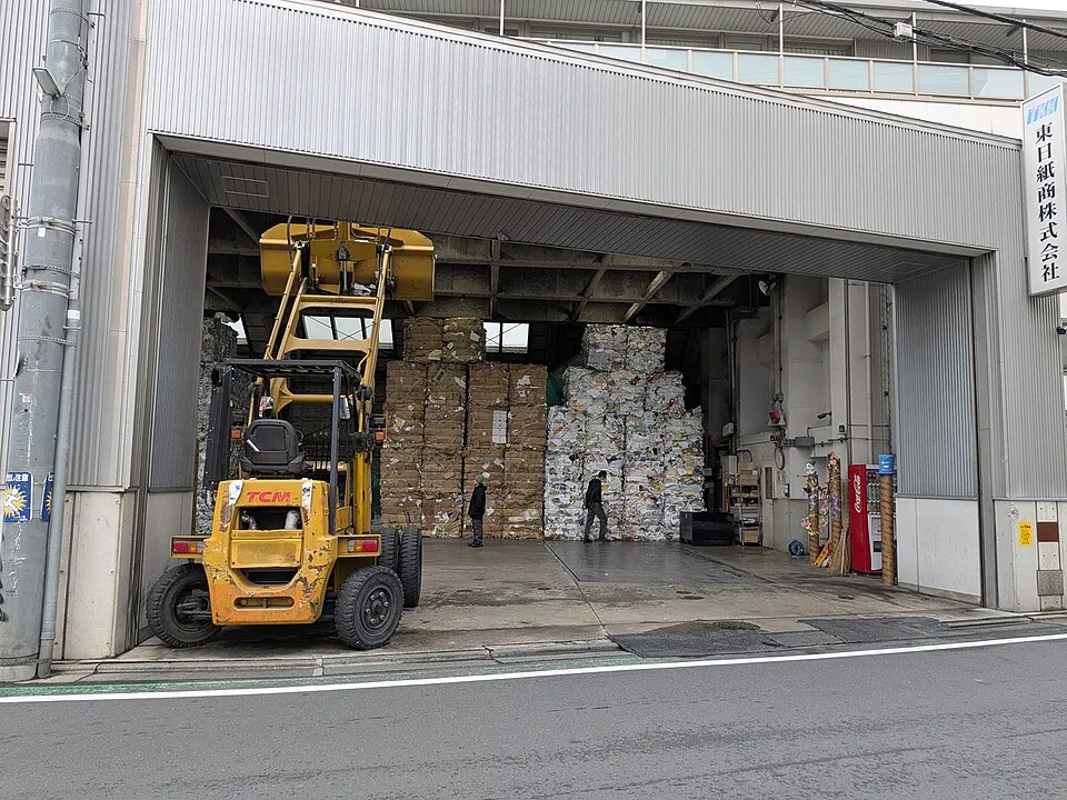 Context photograph: Used paper compacting in Meguro, presumably for recycling (56540); paper context, not an identified product or supplier on this page.