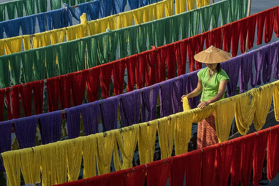 Context photograph: Drying the cotton silk fabric; textile context, not an identified product or supplier on this page.