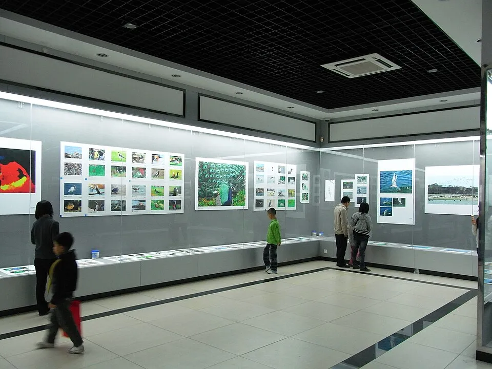 Context photograph: Xinhui 新會 景堂圖書館 Jingtang Library night 02 exhibition hall interior April-2012; events context, not an identified product or supplier on this page.