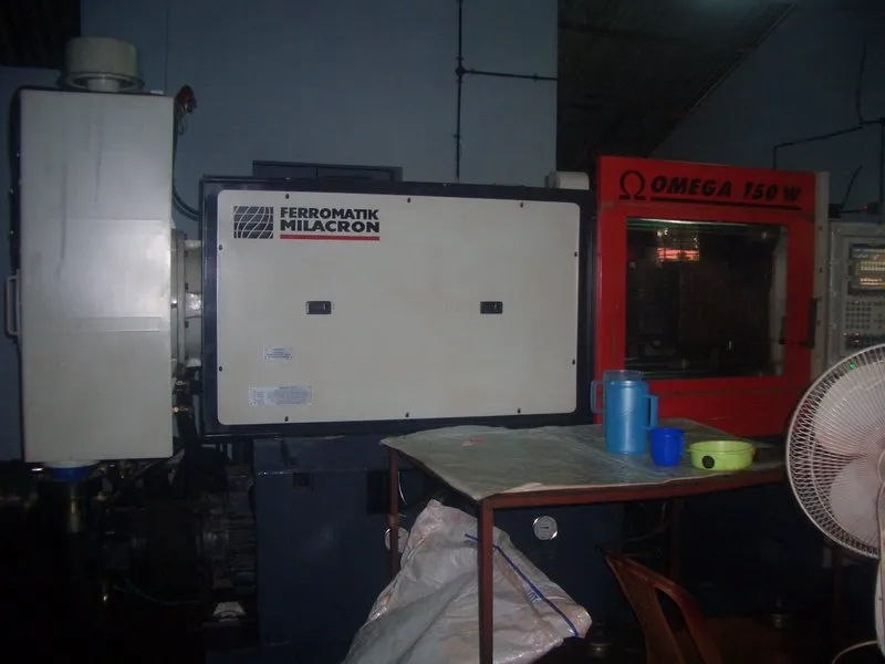 Context photograph: Injection moulding machine; polymer context, not an identified product or supplier on this page.