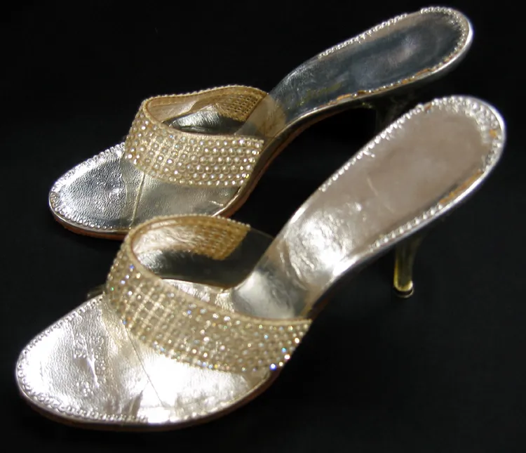 Context photograph: Lucite shoes plastic lucite rhinestone leather 2007.037; polymer context, not an identified product or supplier on this page.