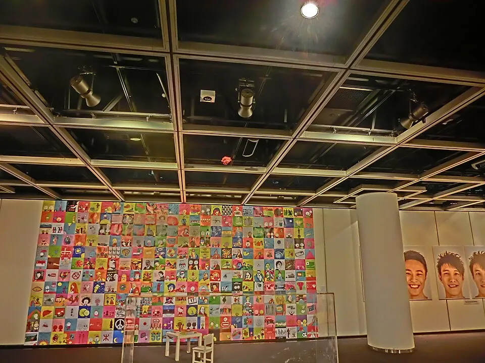Context photograph: HK Central City Hall lower block Exhibition Hall interior 葉欣 Ip Yan artwork wall Aug-2013; events context, not an identified product or supplier on this page.