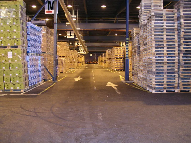 Context photograph: Warehouse md17; operations context, not an identified product or supplier on this page.