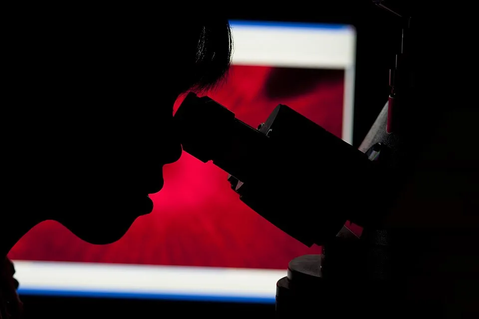 Context photograph: Observing through a Microscope (9955277825); science context, not an identified product or supplier on this page.
