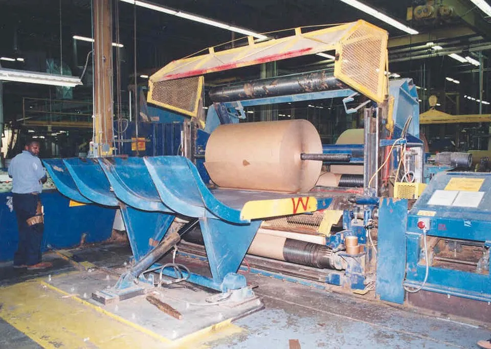 Context photograph: Paper cutting machinery; paper context, not an identified product or supplier on this page.