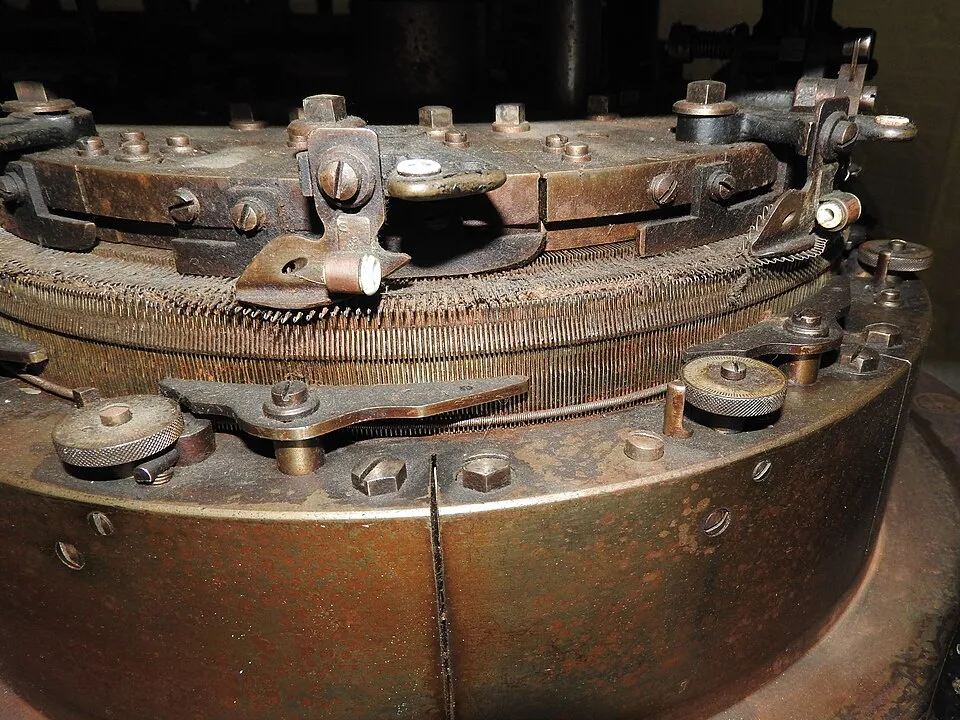 Context photograph: NIM Wildman Circular knitting machine 2517c; textile context, not an identified product or supplier on this page.