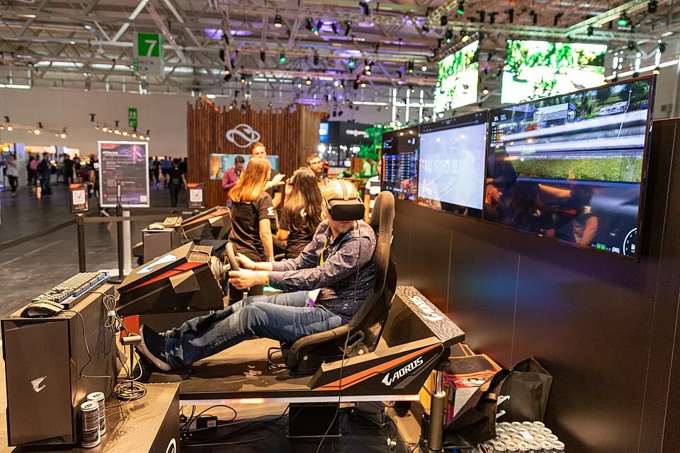 Context photograph: AORUS VR racing simulator Gamescom 2019 (48605696576); events context, not an identified product or supplier on this page.