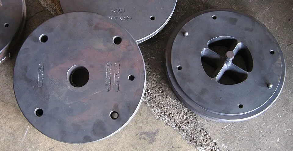 Context photograph: Al extrusion die set; metal context, not an identified product or supplier on this page.